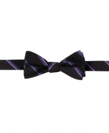 Put a twist on the standard with this striped bow tie from DKNY. Put a twist on the standard with this striped bow tie from DKNY.