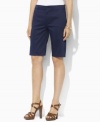 Designed for a flattering, slimming fit from lustrous stretch cotton sateen, these chic Lauren by Ralph Lauren Bermuda shorts are the epitome of timeless, preppy style.