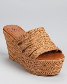 Slip on Lucky Brand's Havana slides for a nod to resort-worthy style--these braided beauties are begging to be taken on your next tropical adventure.