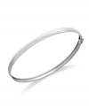 Subtle, yet stylish. Giani Bernini's bangle, set in sterling silver, represents a look that's both classic and contemporary with an elegant touch. Approximate diameter: 2-1/2 inches.