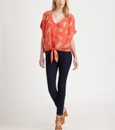 An effortlessly-chic silk topper, tied at the waist in a soft blouson silhouette with comely dolman sleevesV necklineDropped shouldersShort dolman sleevesButton frontTie waistAbout 23½ from shoulder to hemSilkDry cleanImportedModel shown is 5'10 (177cm) wearing US size Small.