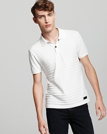 Tonal white stripes stand out with a raised texture on the Burberry Sport Wiseman polo. Tonal white stripes stand out with a raised texture on the Burberry Sport Wiseman polo.