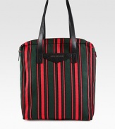 A versatile shopper tote for the man on-the-go, rendered in a sharply striped cotton blend with pebbled leather handles.Zip closureDouble top handles, 26 dropInterior zip pocket70% cotton/20% polyester/10% leather14W x 17H x 3DImported