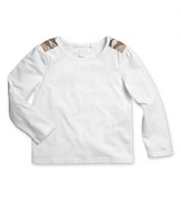 Signature check detailing on the shoulders embellishes a classic shirt.