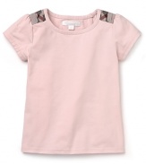 A classic, subtle tee from Burberry in feminine pastel pink.