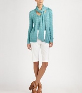 Finespun cable-knit silk, in a classic silhouette with a matching detachable scarf.V neckButton frontLong sleevesRib-knit cuffs and hemWelt pocketsRemovable scarf attaches with single back buttonSilkDry cleanImportedModel shown is 5'10½ (179cm) wearing US size Small. 