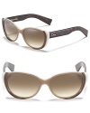 Chic cat eye sunglasses with contrast winged temples and logo embellished arms.