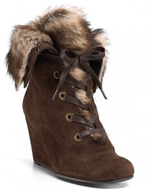Lace-up wedge booties hit high-level luxe in soft fur and supple suede. By Stuart Weitzman. Lace-up wedge booties hit high-level luxe in soft fur and supple suede. By Stuart Weitzman.