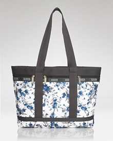 LeSportsac's latest travel tote features a feminine floral print, sure to add a pop of pretty whether you're embarking on a foreign adventure or darting around town. LeSportsac's latest travel tote features a feminine floral print, sure to add a pop of pretty whether you're embarking on a foreign adventure or darting around town.
