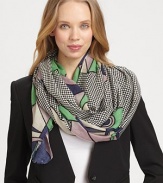 Luxurious cashmere/silk, in a modern, geometric cat print, has an exceptionally soft drape.70% cashmere/30% silkAbout 28 X 80Dry cleanImported