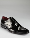 A shiny patent leather dress shoe completes your black-tie attire in classic style.