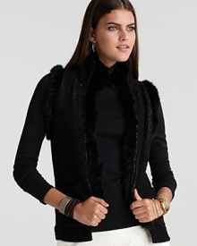 Infuse your season with two luxe trends. This Theory vest boasts lavish rabbit fur on one side and a rich mixed knit on the other for a decadent look for your day-to-night wardrobe.