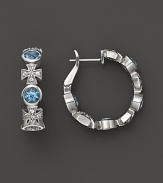 Faceted Swiss blue topaz and white sapphire Maltese crosses, set in sterling silver, are an elegant take on the classic hoop. By Elizabeth Showers.