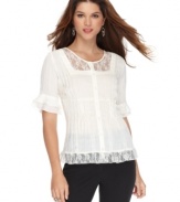 NY Collection gives us a frill! This petite lacy blouse looks just right for day or night.