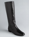 These kate spade new york riding boots have a charming touch; signature spade-shaped charm zipper pulls.