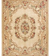 Modeled after 17th century Aubusson rugs, the Jade area rug offers a traditional floral motif in a contemporary cream and ivory colorway. Crafted of rich wool.
