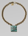 An antique-inspired piece with modern appeal featuring a square pendant of turquoise on a link chain. TurquoiseBrassLength, about 20Pendant size, about ¾Hook clasp closureMade in USA