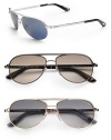 Modern and sporty shades in lightweight metal. Available in shiny rhodium frames with blue lenses, shiny gunmetal frames with brown gradient lenses or shiny rose gold frames with grey gradient lenses. 100% UV protective Made in Italy 