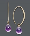 Classic hoops with an extra pop of purple color. Earrings feature a long hoop design in 14k gold and delicate amethyst teardrops (6-1/2 ct. t.w.). Approximate diameter: 1-1/2 inches.
