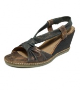 Get back to your roots. Distressed fabric lends an earthy vibe to the wear-everywhere Pola wedges by Donald J Pliner.