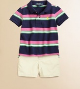 A classic short-sleeved polo shirt is updated in bold striped mesh.Ribbed polo collarShort sleevesButton downUneven vented hemCottonMachine washImported Please note: Number of buttons may vary depending on size ordered. 