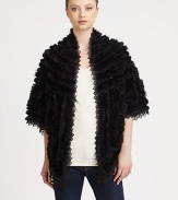 Luxurious rabbit fur with lace insets and trim in a statement-making style that exudes romanticism.Dyed rabbit furOpen frontThree-quarter sleevesAbout 36 from shoulder to hem80% rayon/20% nylon laceSpot cleanImportedRabbit fur origin: China