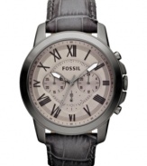 A ruggedly styled Grant collection watch from Fossil with dusky touches that perfectly complement the rich leather strap.