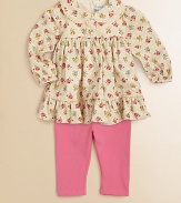 This pretty set set pairs a frilly, floral tunic with matching leggings for a charming ensemble. Tunic Peter Pan collarLong sleevesBack buttonsGathered yokeRuffled hem Leggings Elastic waistbandCottonMachine washImported Please note: Number of buttons may vary depending on size ordered. 