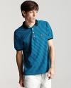 Offering timeless wearabilty, this striped Burberry polo is a contemporary classic.