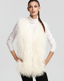 Make a lavish style statement in this Rachel Roy vest, rendered in plush cream fur. Wear it with sleek ponte pants for an undeniably stunning contrast.