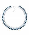 Frost your neckline with icy shimmer. Swarovski's hot collar necklace features two sparkling rows of Montana blue and clear crystals. Set in silver tone mixed metal. Approximate length: 15 inches.