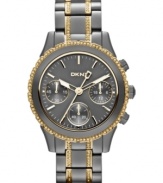 Dusky gunmetal tones blend impeccably with golden accents on this DKNY watch.