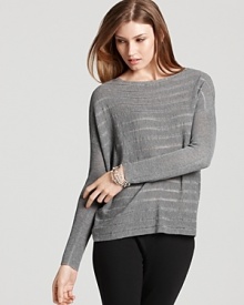 Pull on easy elegance with this Eileen Fisher boat neck top boasting a boxy silhouette and subtle stripes. Pull on easy elegance with this Eileen Fisher boat neck top boasting a boxy silhouette and subtle stripes.