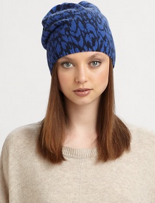 A bold animal print lends a wild touch to an ultra-soft wool and angora blend topper.Merino Wool/Angora/Nylon10W X 9.5LDry cleanImported A bold animal print lends a wild touch to an ultra-soft wool and angora blend topper.Merino Wool/Angora/Nylon10W X 9.5LDry cleanImported
