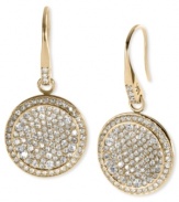 Round resplendence. This pair of drop earrings from Michael Kors, which are crafted from gold-tone ion-plated steel, dazzle with glass accents on the concave pendant. Approximate drop: 1 inch.