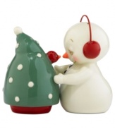 Salt and pepper have never been sweeter. A snowman goes nose to beak with a Christmas cardinal in a Department 56 duo that's worth celebrating year after year.