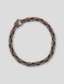 A unique, engraved mix of cocoa bronze and polished, 18K gold in an anchor link design. Bracelet, about 8½ long Lobster clasp closure Made in USA A unique, engraved mix of cocoa bronze and polished, 18K gold in an anchor link design. Bracelet, about 8½ long Lobster clasp closure Made in USA