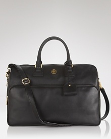 Take Tory Burch's polished style with you when you travel. Crafted from leather, this piece has a well traveled look with a roomy capacity that will allow you to pack everything you need. Take Tory Burch's polished style with you when you travel. Crafted from leather, this piece has a well traveled look with a roomy capacity that will allow you to pack everything you need.