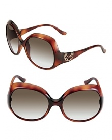 Sleek Fendi sunglasses with metal logo detail at dip temples.