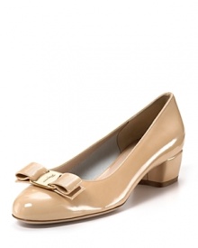 A logo-etched buckle tops these sleekly-styled low-heeled pumps.