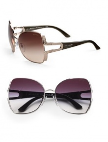 A unique 146 Swarovski crystal Parentesi embellishment inspired by the joints of Roman pavement adds a glamorous touch to these contemporary metal shield frames. Available in light brown with brown gradient lens or palladium with grey gradient lens.UV 400 lens Made in Italy A unique 146 Swarovski crystal Parentesi embellishment inspired by the joints of Roman pavement adds a glamorous touch to these contemporary metal shield frames. Available in light brown with brown gradient lens or palladium with grey gradient lens.UV 400 lens Made in Italy