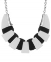 Glam it up! Geometric equals chic in Haskell's stunning statement-maker. A large frontal design combines bold shapes and contrasting color. Crafted in black and silver tone mixed metal. Approximate length: 18 inches + 3-inch extender. Approximate drop: 1-1/2 inches.