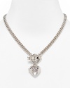 A pave logo-embossed heart locket on chainlink necklace with bow toggle closure from Juicy Couture.