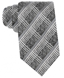 Dual patterns add double the interest to your day with this silk tie from Alfani. Dual patterns add double the interest to your day with this silk tie from Alfani.