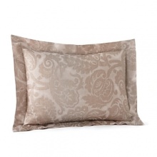 Egyptian cotton is woven in Italy into a serene and sweet sateen jacquard. Large scrolls play across the shining surface of the duvet covers and shams, each finished with a plain hem and decorated with a subtle flange. The duvet covers are backed in a plain sateen while the shams feature the jacquard pattern on the front and back. Egyptian cotton is woven in Italy into a serene and sweet sateen jacquard. Large scrolls play across the shining surface of the duvet covers and shams, each finished with a plain hem and decorated with a subtle flange. The duvet covers are backed in a plain sateen while the shams feature the jacquard pattern on the front and back.
