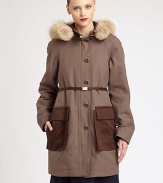 Ultra-soft fox fur trims the hood of this seasonal essential, updated with oversize contrast pockets.Fox fur trimmed hoodFront buttonsLong sleevesSkinny belt with utility buckleContrast front flap pocketsBack storm flapAbout 34 from shoulder to hemCottonTrim: fox furDry clean by fur specialistImportedFur origin: USAModel shown is 5'10 (177cm) wearing US size Small.