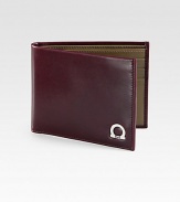 Remarkably smooth calfskin leather lends a distinguished tone to a classic wallet, accented with signature gancini ornament.Two billfold compartmentsSix card slotsLeather4W x 3HMade in Italy