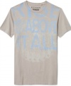 Go bold. This graphic t-shirt from Guess gives your look a leg up.