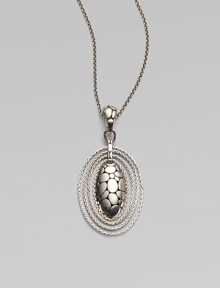 From the Kali Zen Collection. A graceful yet striking oval - with the Kali stepping-stone texture on the front, an open filigree back and rope chain edging - hangs from a sterling silver woven chain. Sterling silver Chain length, about 36 Pendant length, about 2½ Pendant width, about 1¼ Lobster clasp Made in Bali From the Kali Zen Collection. A graceful yet striking oval - with the Kali stepping-stone texture on the front, an open filigree back and rope chain edging - hangs from a sterling silver woven chain. Sterling silver Chain length, about 36 Pendant length, about 2½ Pendant width, about 1¼ Lobster clasp Made in Bali