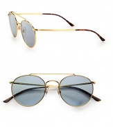 Small-frame metal sunglasses take a fresh approach to a cool vintage look. Available in gold frames with blue lenses.Metal100% UV ProtectionImported